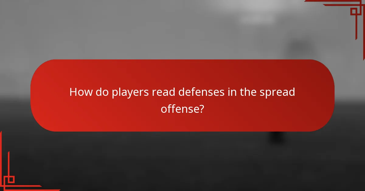 How do players read defenses in the spread offense?
